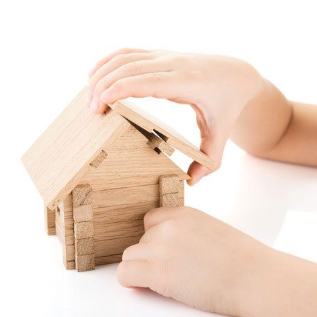 child-hands-build-house