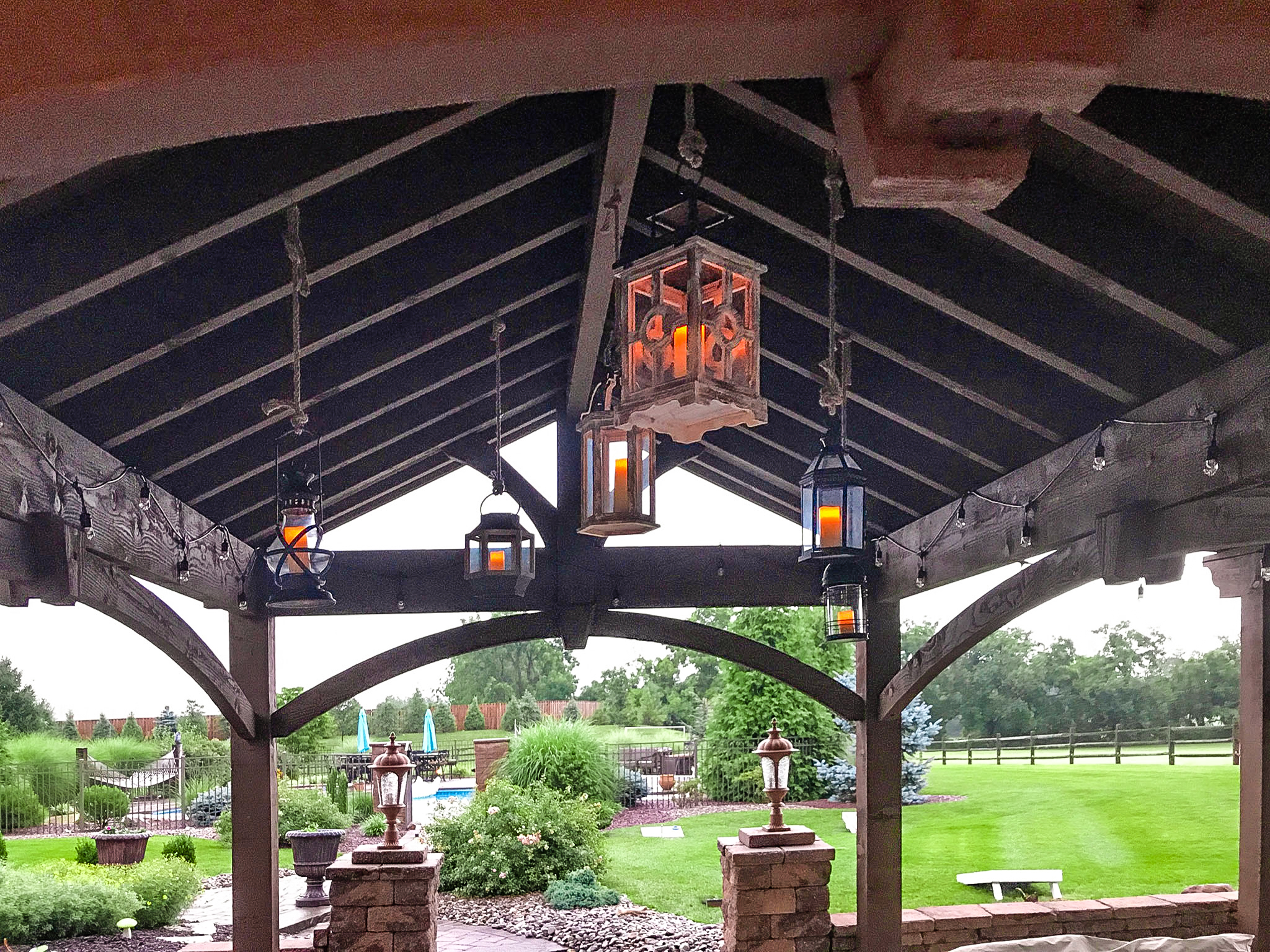 Lanterns from pavilion roof hang