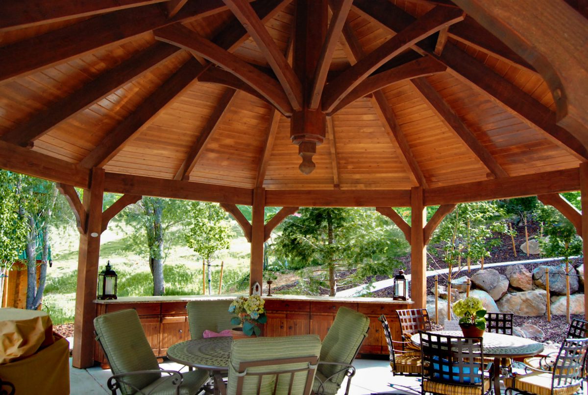 timber framed gazebo with outdoor furniture