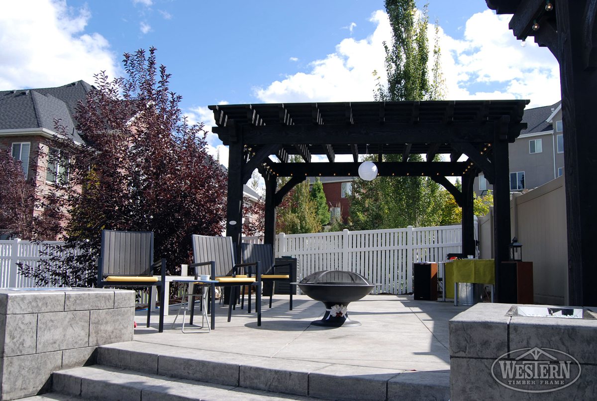 black pergola fire pit patio