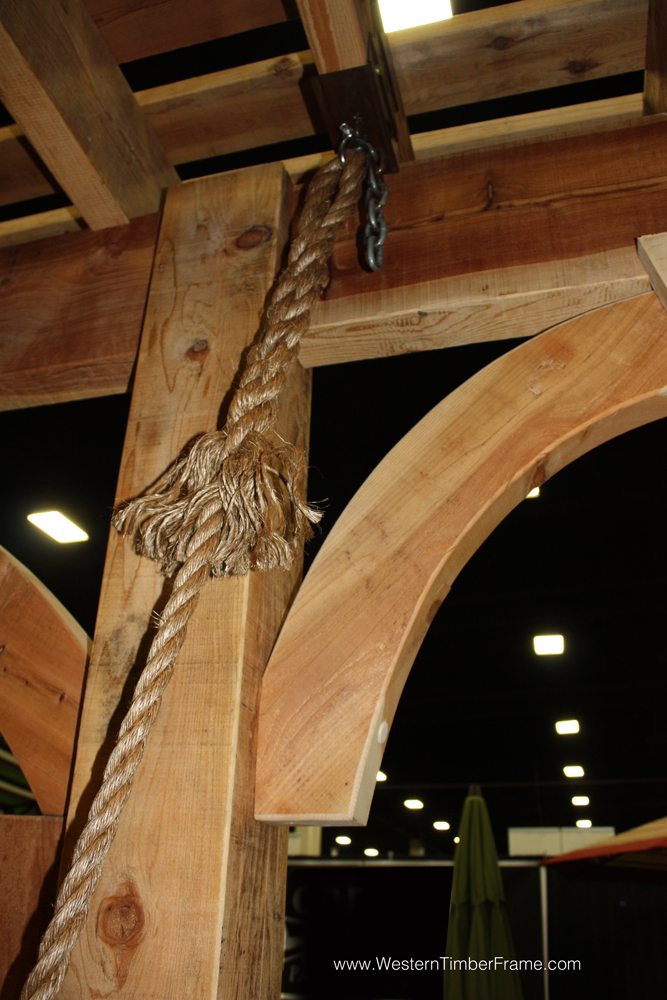 heavy-duty rope hanging from pergola rafter