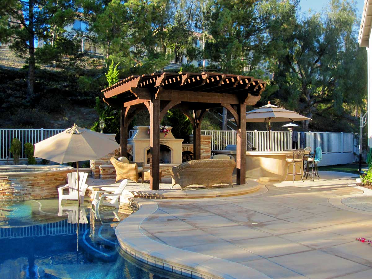 outdoor fireplace poolside pergola shade timber frame