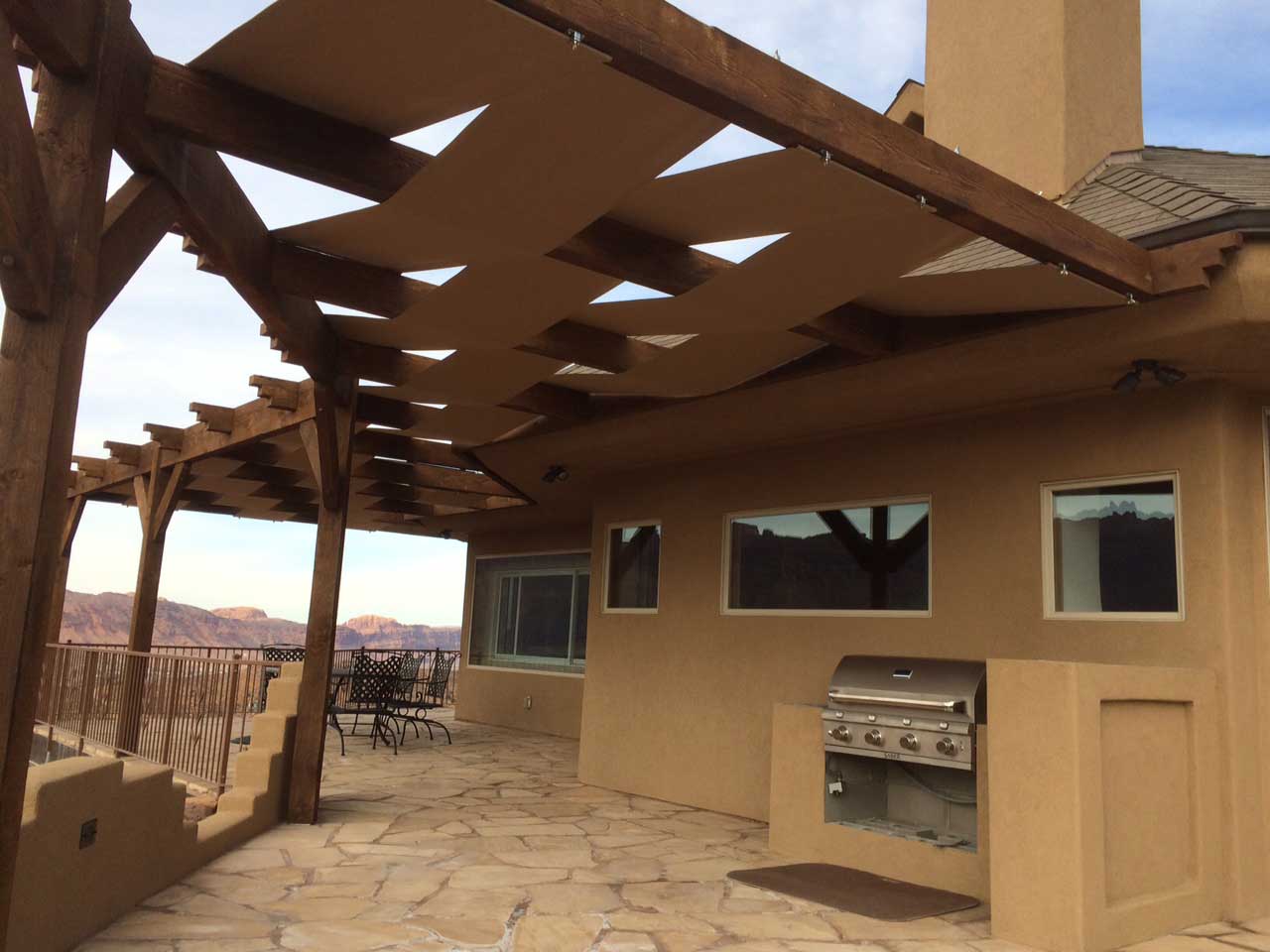 attached pergola custom outdoor kitchen