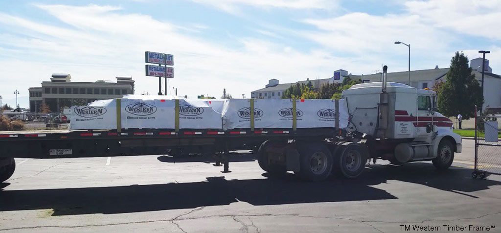 semi truck leaving shop with pergola kit