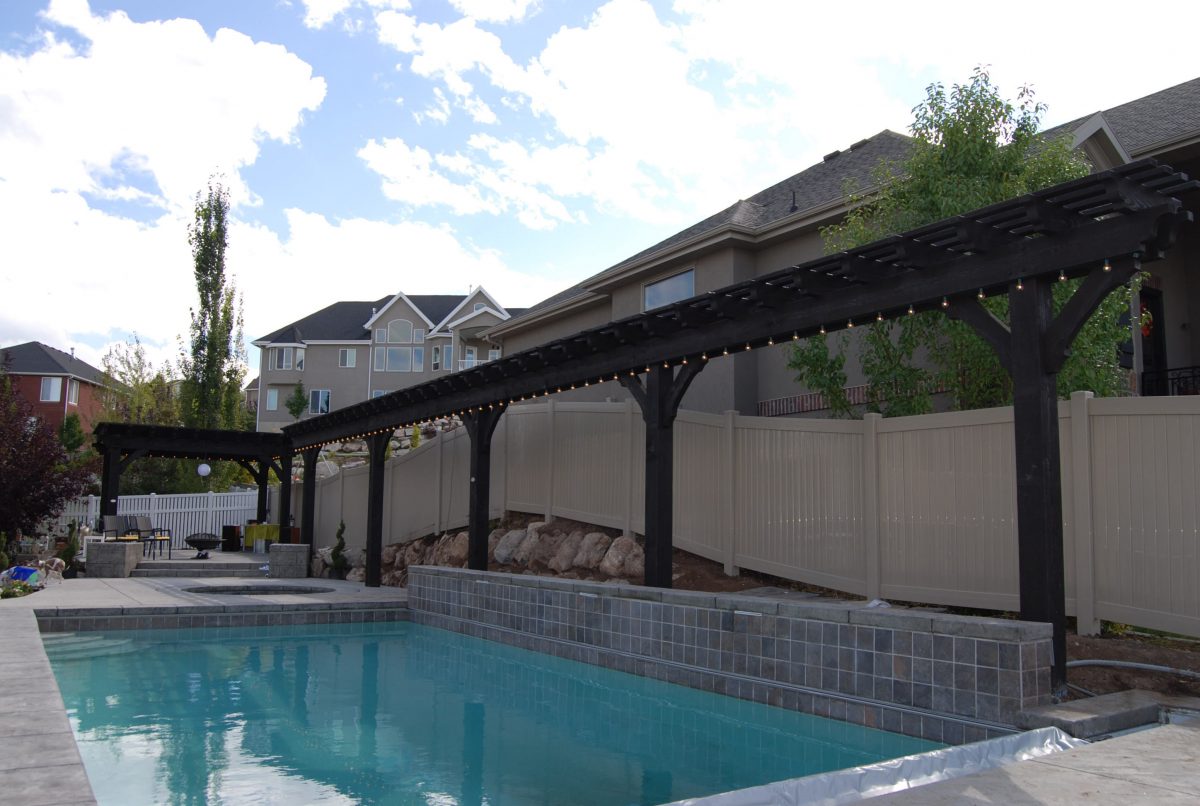 Lights on trellis by pool