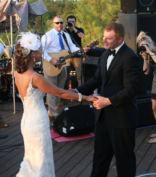 gazebo-people-dreamseekers-wed dancing on wedding day outdoors