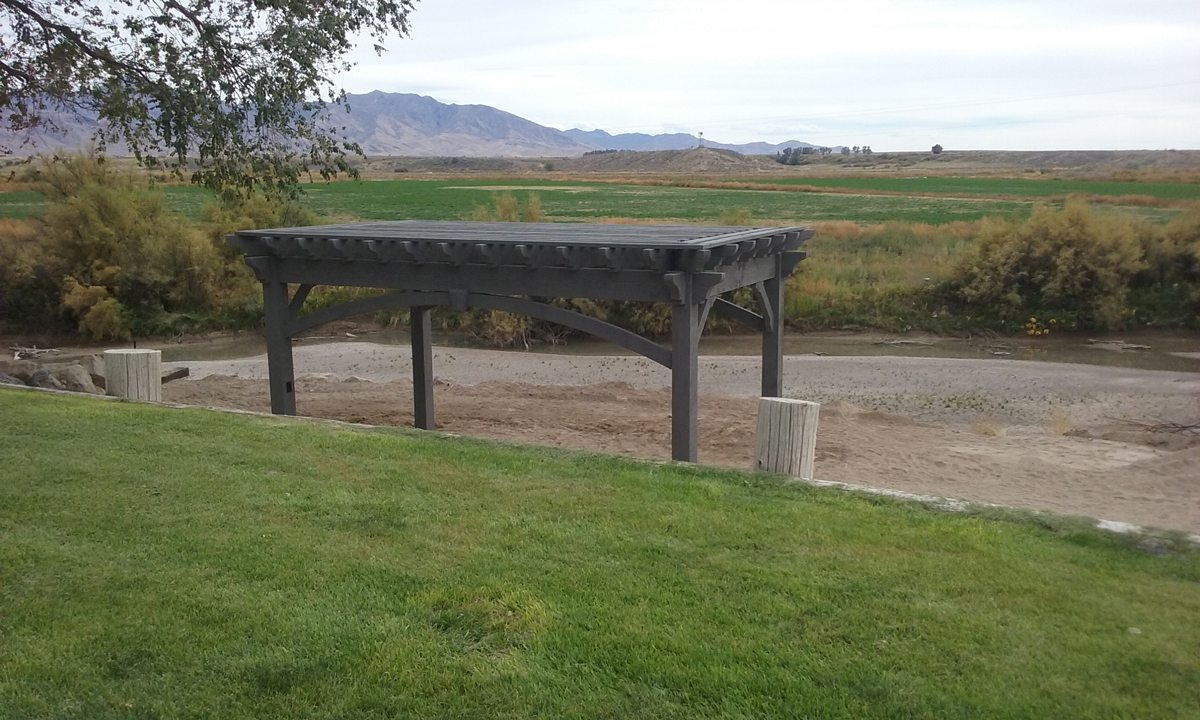 Timber frame pergola installed next to river
