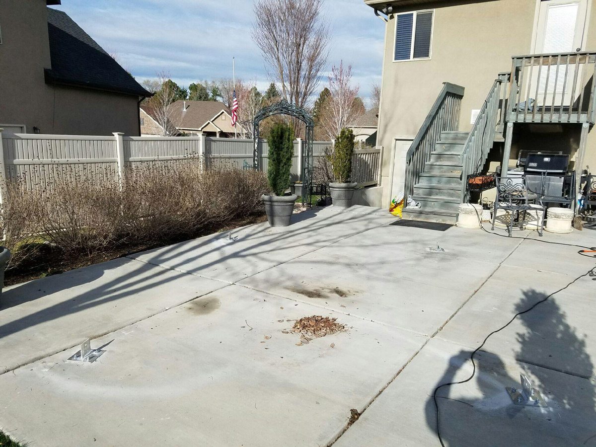 anderson-before-pergola concrete patio before