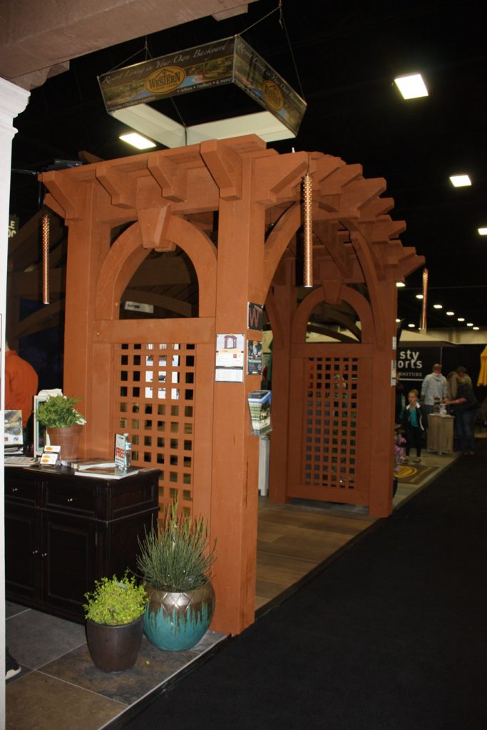 Arched timber frame arbor with trellises