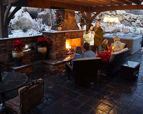 family celebrating in under a gazebo kit