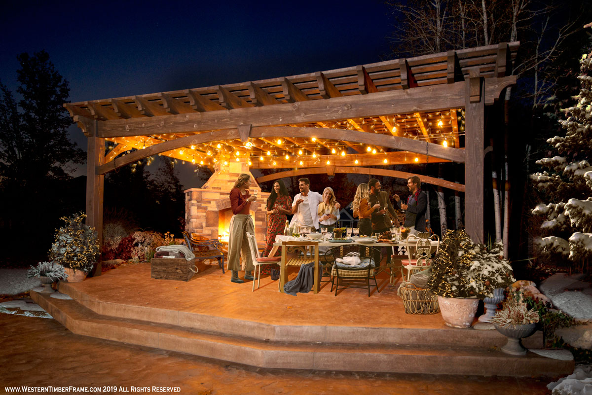 pergola kit in outdoor space with people comfortable in the snow