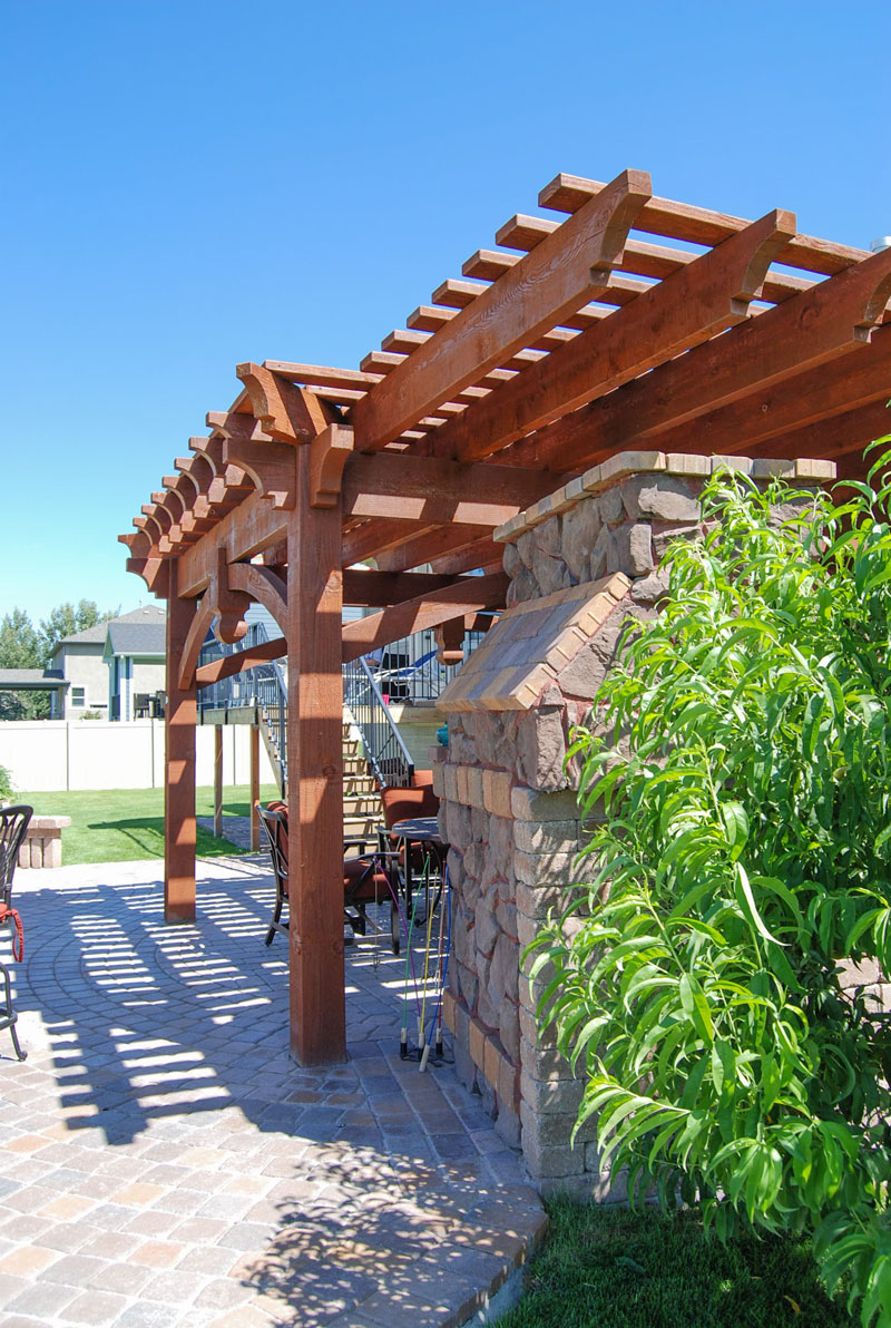 Extended roof over an outdoor fireplace