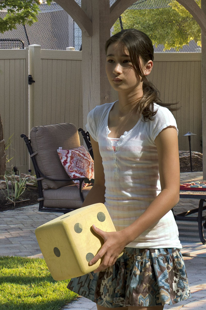 girl-with-large-dice-pavilion dice game girl pavilion