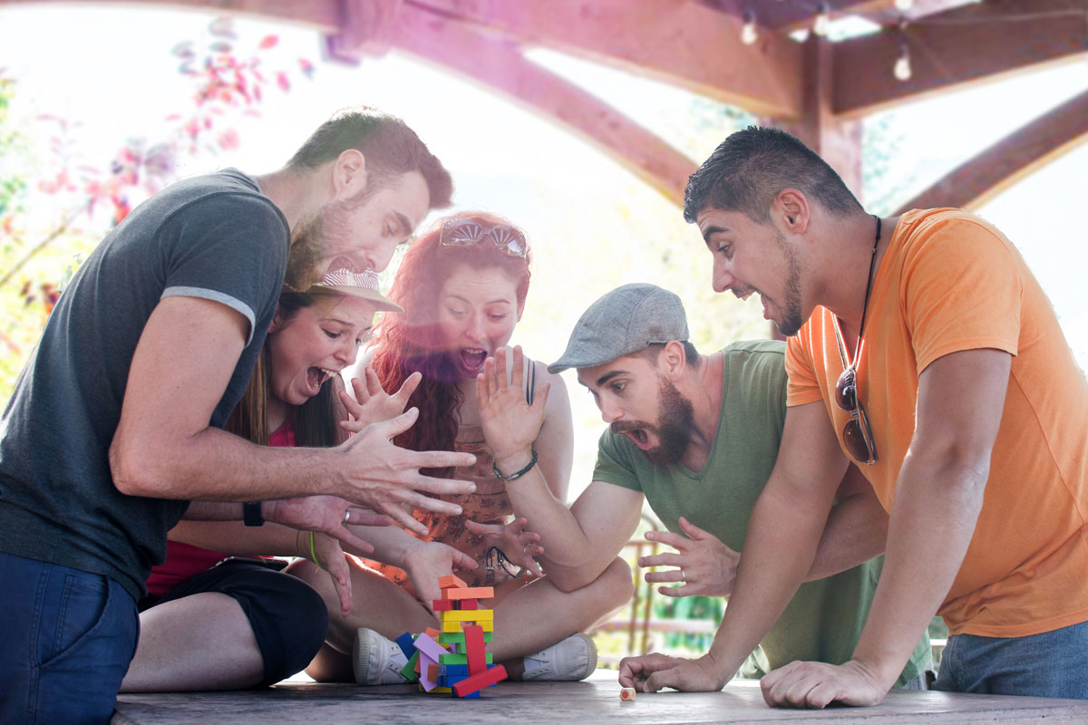 playing block game under pergola