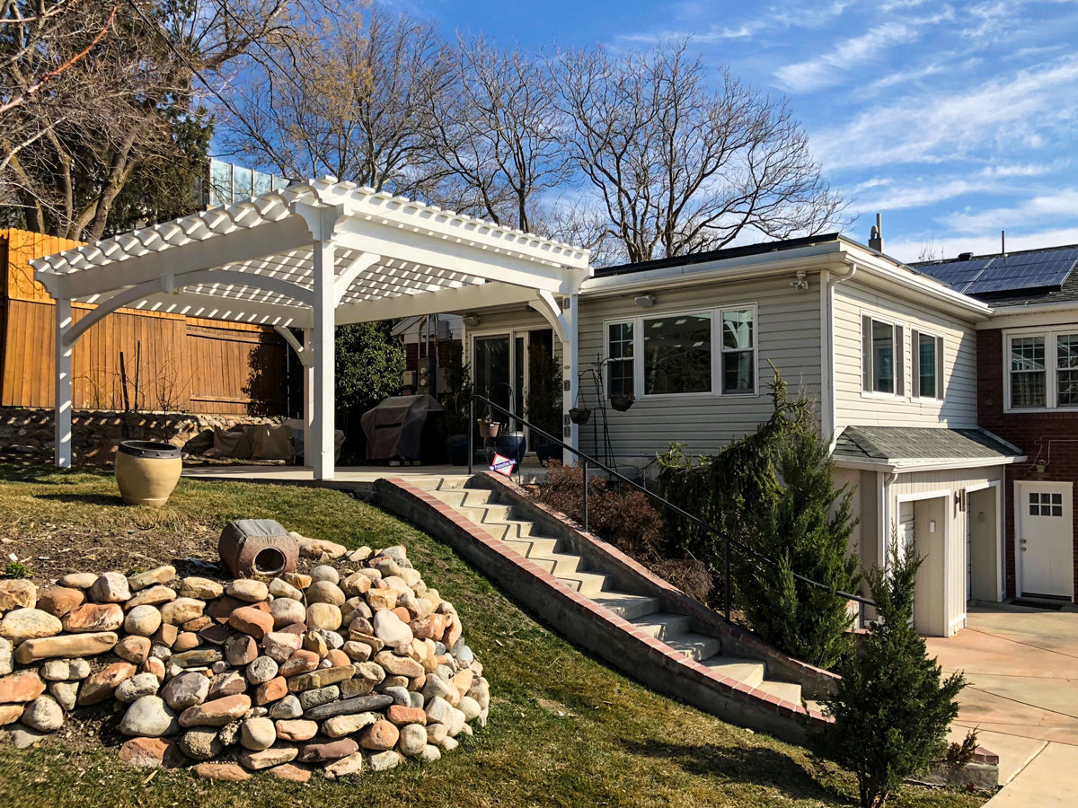 Nader-Oskoui-white-pergola full arch knee brace pergola