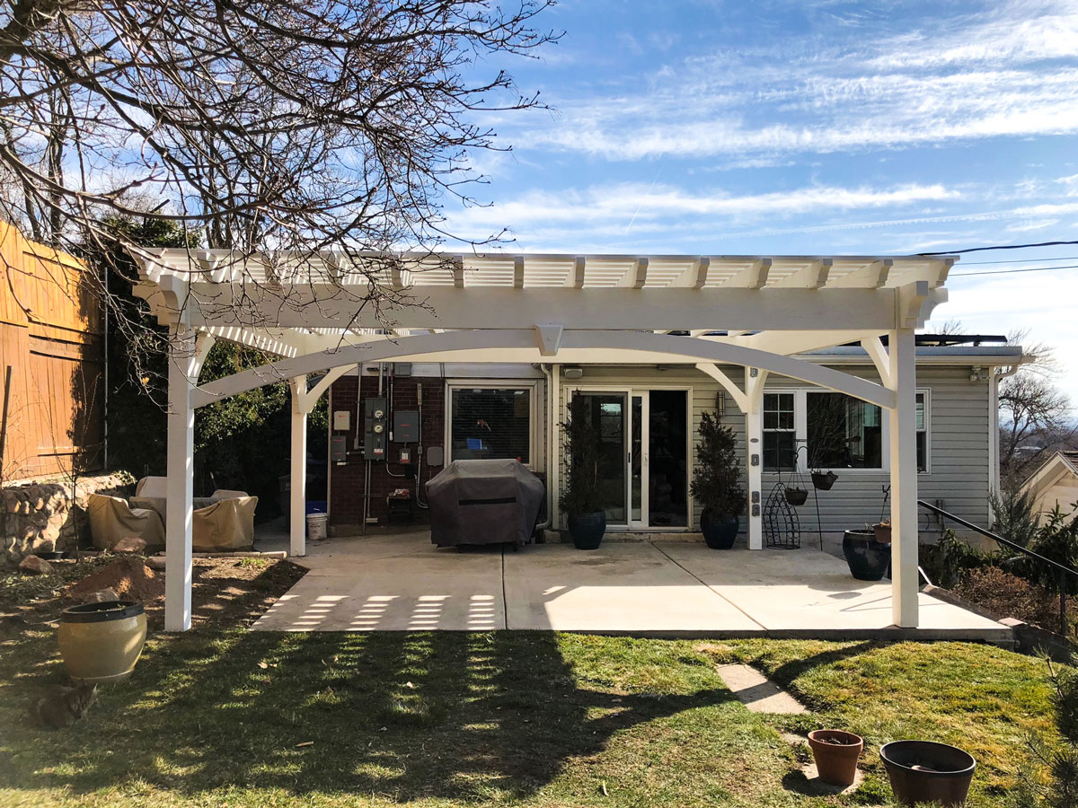 Oskoui-white-pergola full arched knee braces pergola