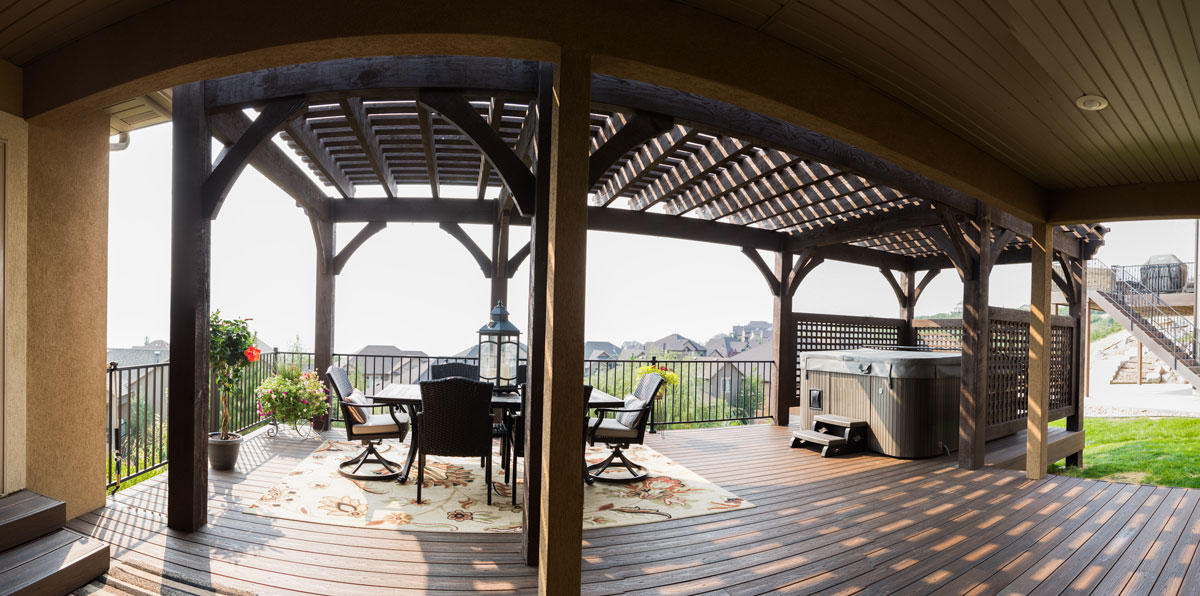 hot tub gazebos covering an outdoor living and dining space