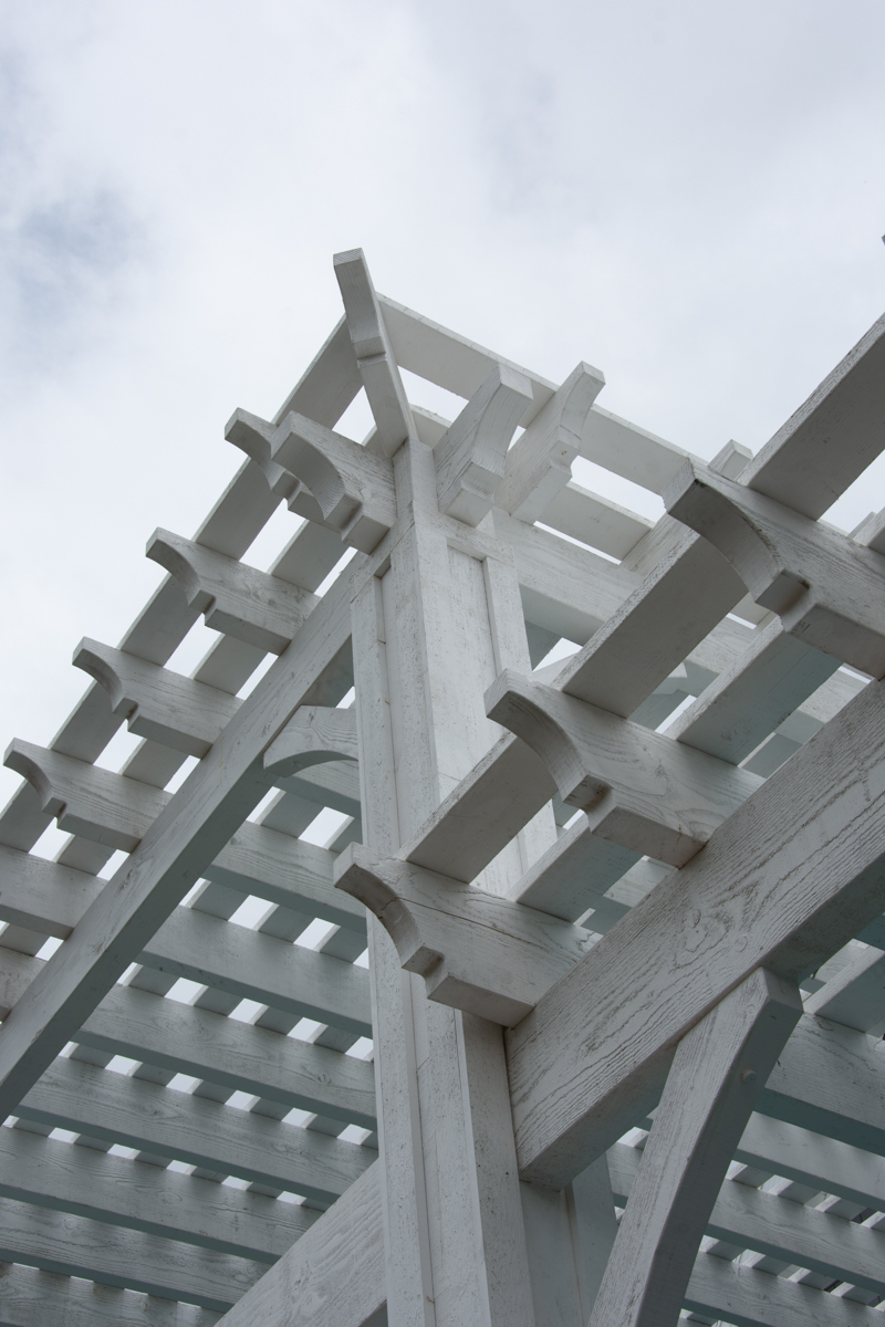 Tiered pergola corner roof