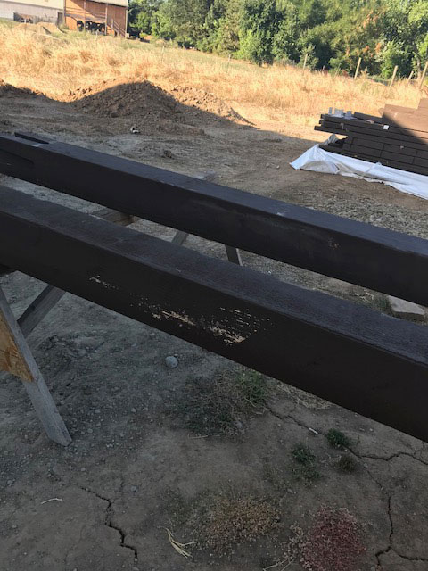 black-pergola-posts-before-touch-up