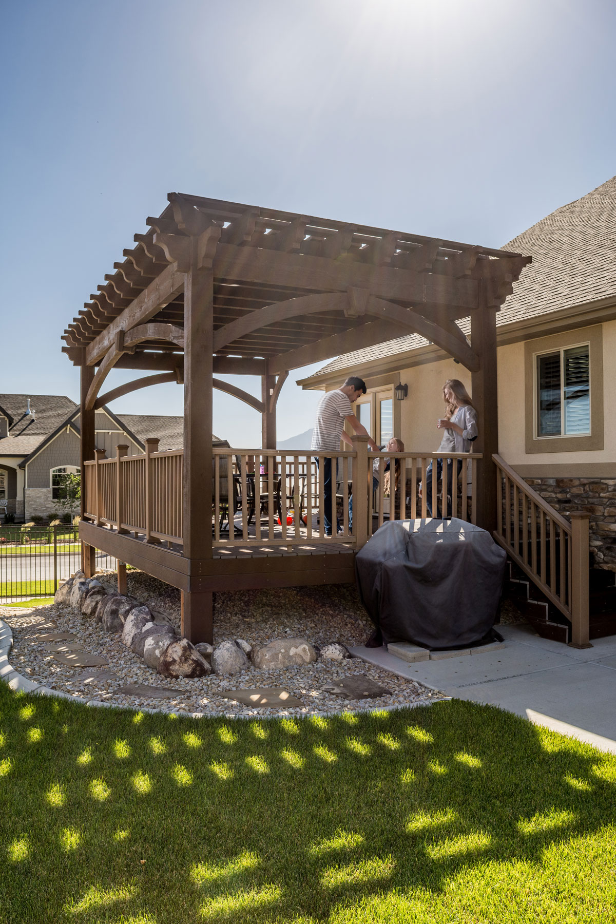 family-on-deck-pergola-shade family on deck