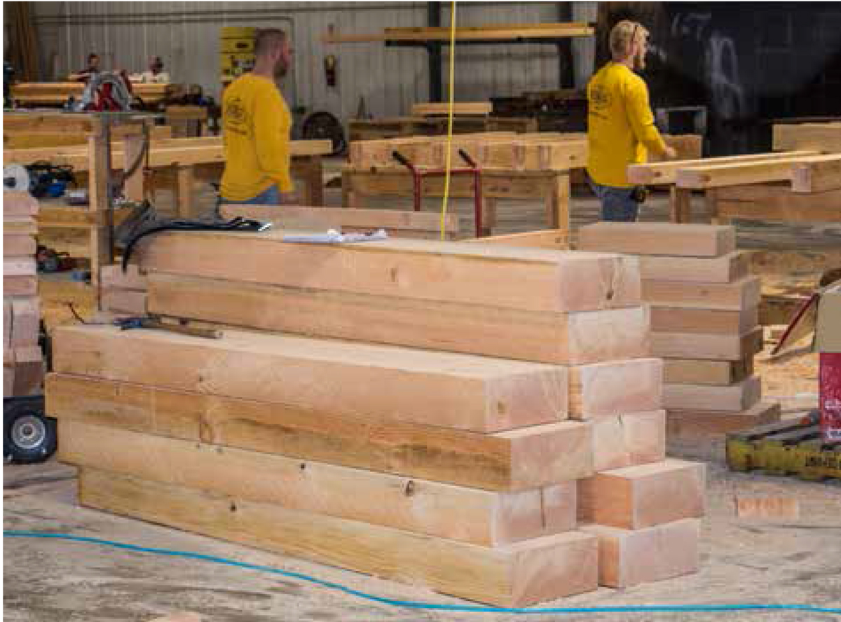 our guys in the shop with timber beams