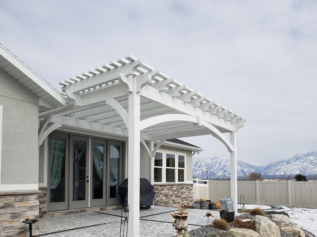 White pergola installed