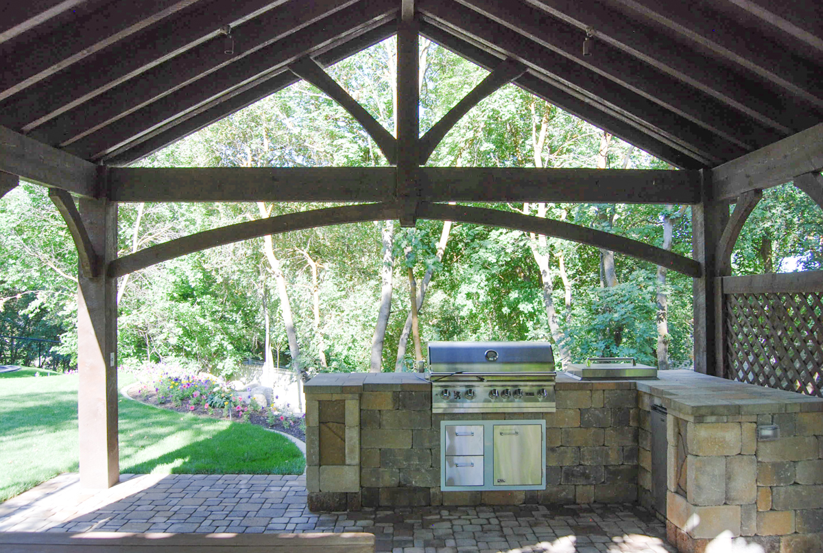 outdoor kitchen pavilion attached to pool house
