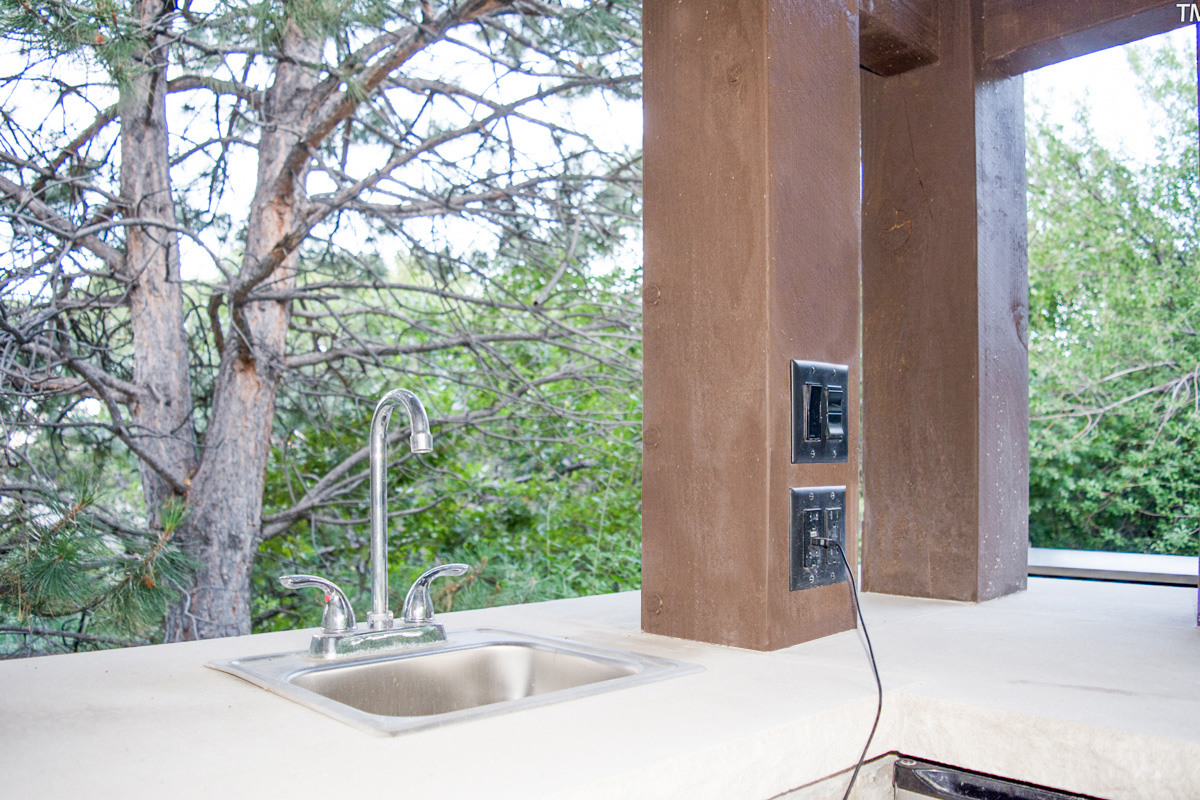 outdoor kitchen sink and integrated power post