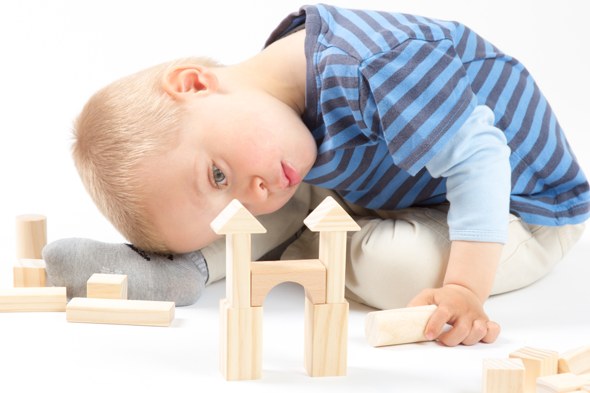 small-boy-build-wooden-blocks #BuildingWithWood