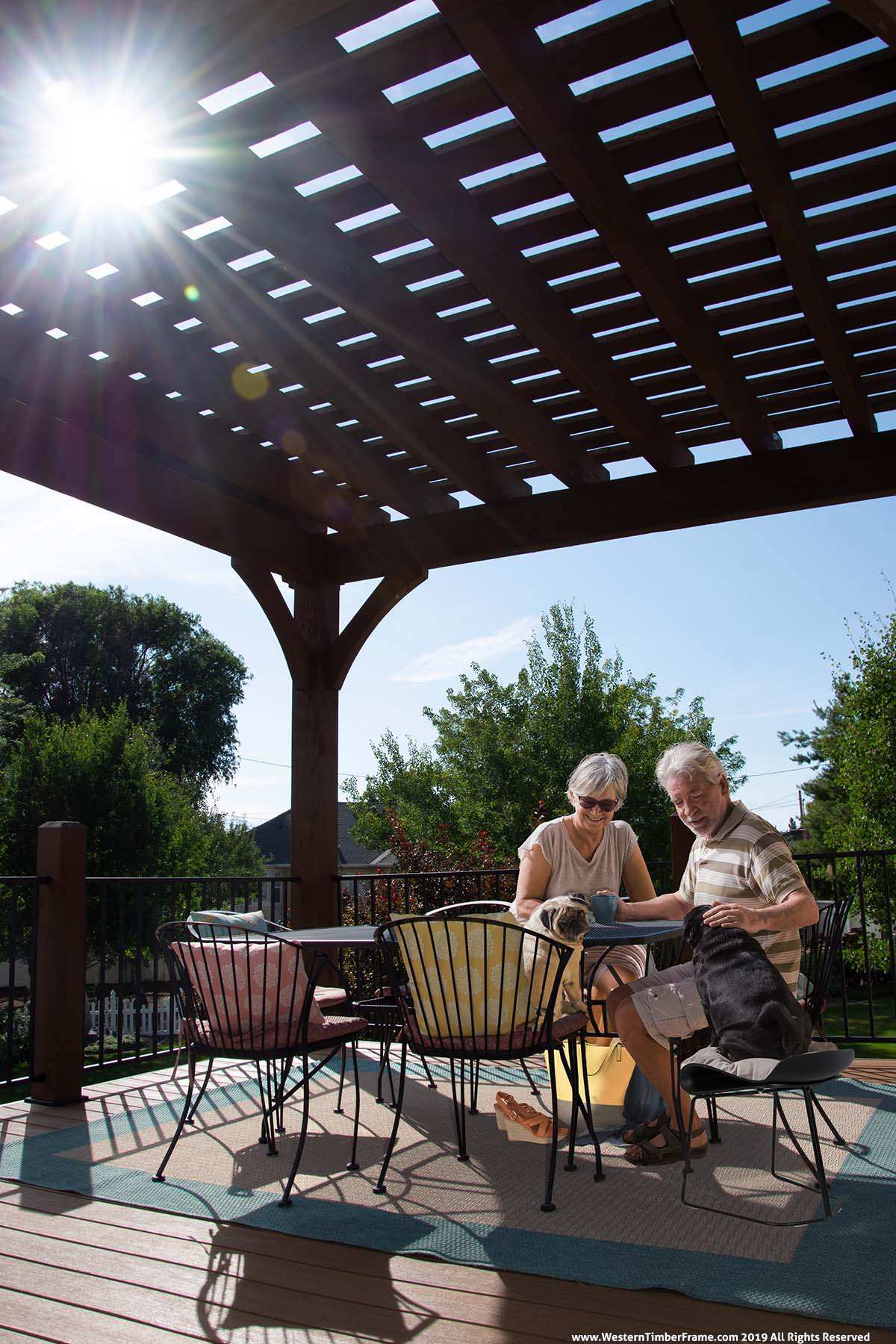 Earls-deck-pergola-couple-dogs-sun sunlight pergola deck dog