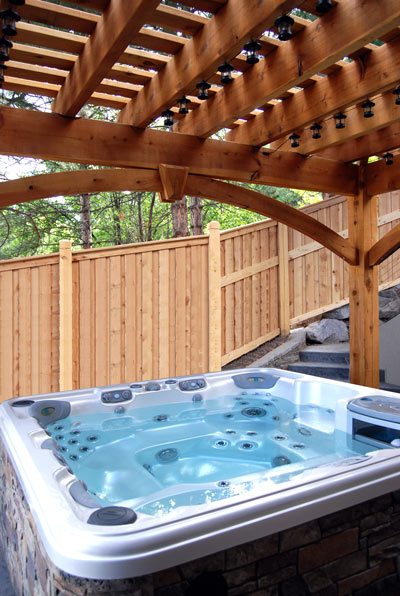 Christenson-12×16-hot-tub-sm wrap around knee brace pergola kit hot tub