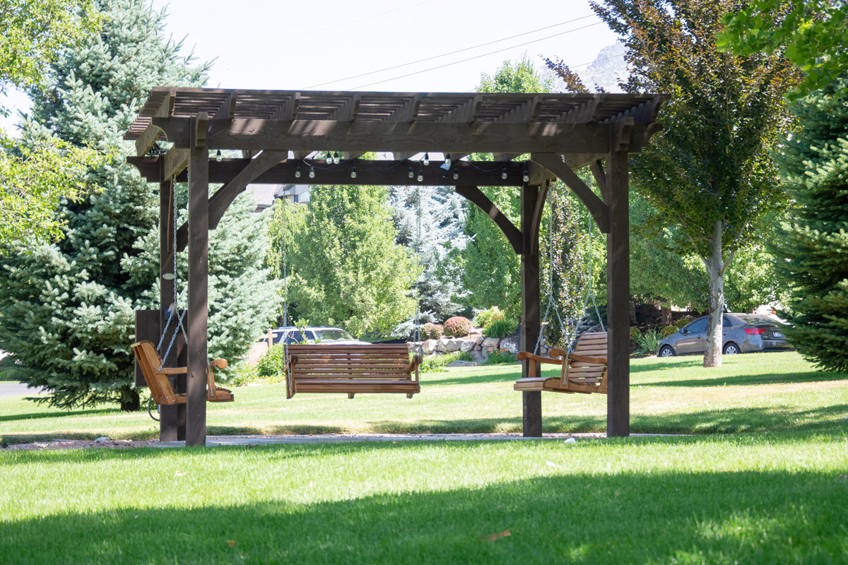 park pergola bench swings