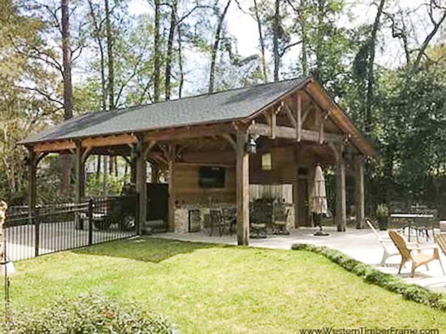 Carport Meets Outdoor Living: Timber Frame Pavilion with Privacy Wall | Western Timber Frame™
