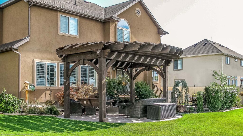 Timber frame pergola with round roof design by Western Timber Frame