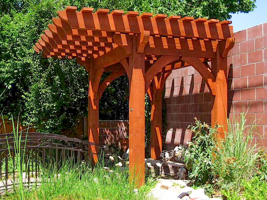 Side view of timber frame pergola with extended cantilevered roof by Western Timber Frame