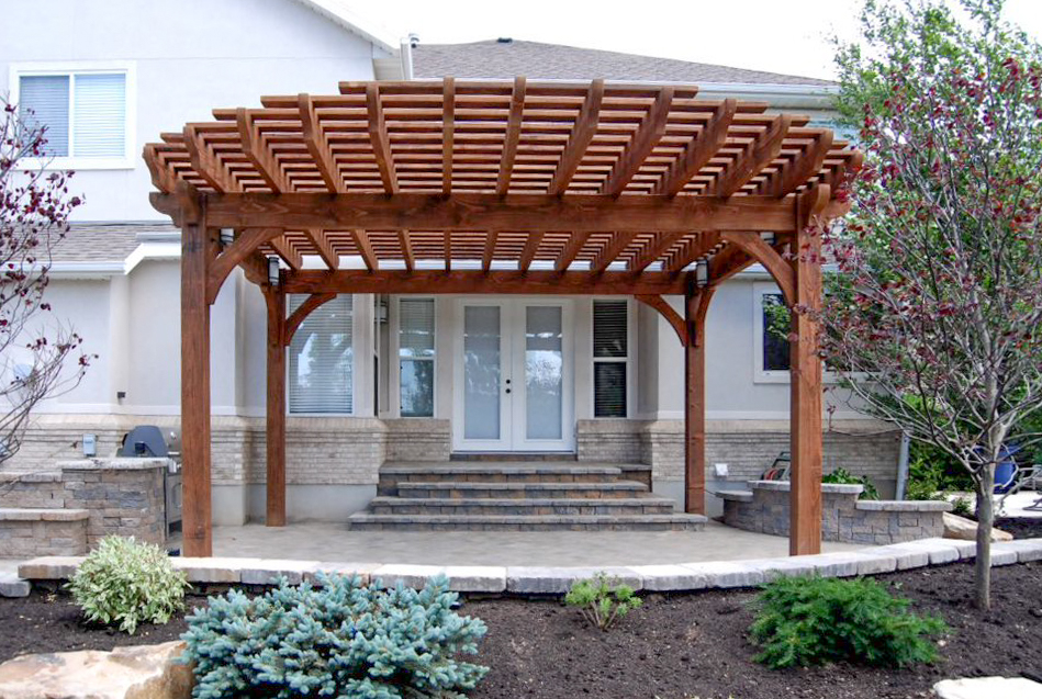 Timber frame pergola with curved half-round cantilevered roof by Western Timber Frame