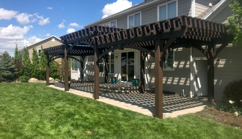 Timber frame pergola with 3-stepped roof design by Western Timber Frame