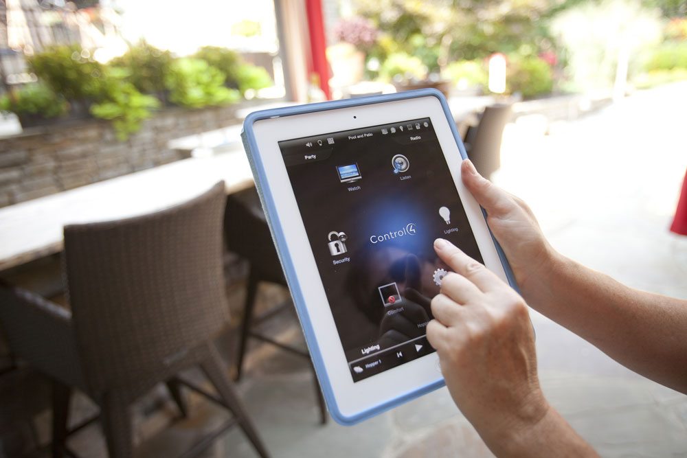 Remote control for opening and closing louvered roof on a Western Timber Frame pergola