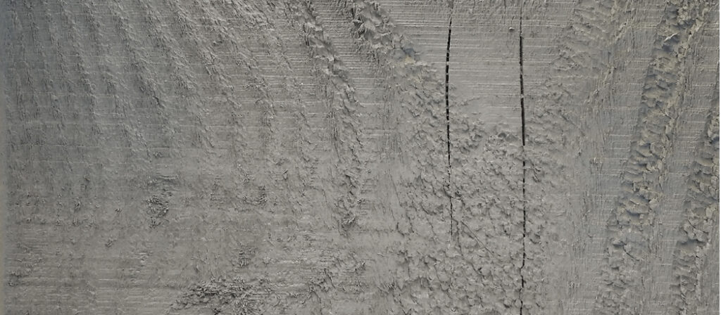 Close-up of Canyon Grey timber stain in soft charcoal-grey tone