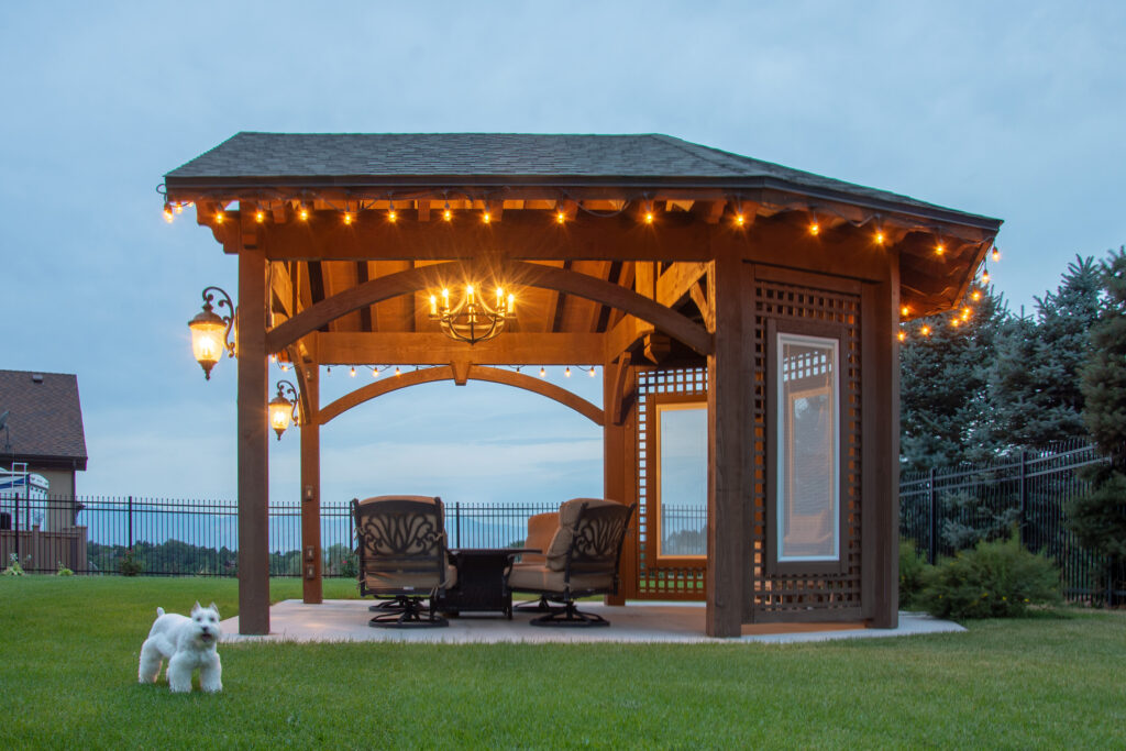 TimberVolt®-powered timber frame gavilion with string lights and chandelier