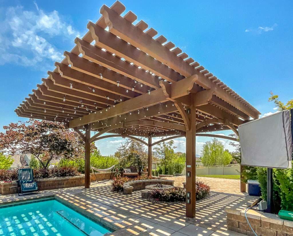 pergola shade print pattern cast by timber rafters over patio and pool area