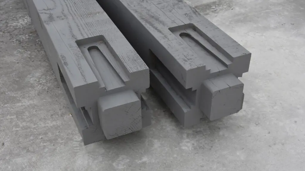 timber beam ends showing dovetail joinery connection system for structural strength